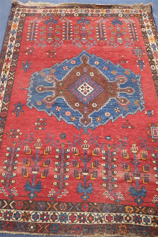 A Shirvan style red ground rug, 210cm x 156cm